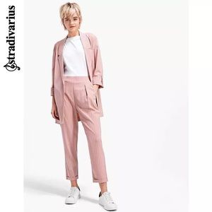 Stradivarius pink blazer and pants set.